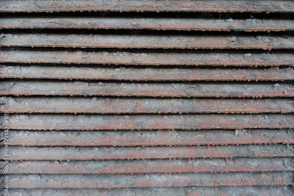 Old rusty dirty peeled horizontal metallic slats Old rusty dirty peeled horizontal metallic slats