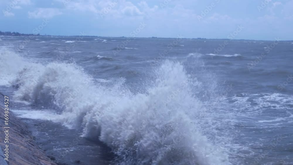 Panorama of the stormy sea, beach, retaining wall Panorama of the stormy sea, beach, retaining wall