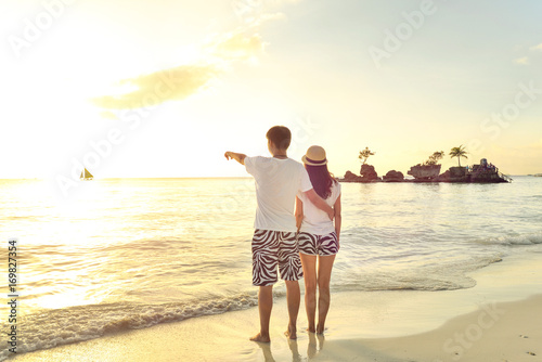 Young lovers on Boracay beach at  sunset ,Philippines.