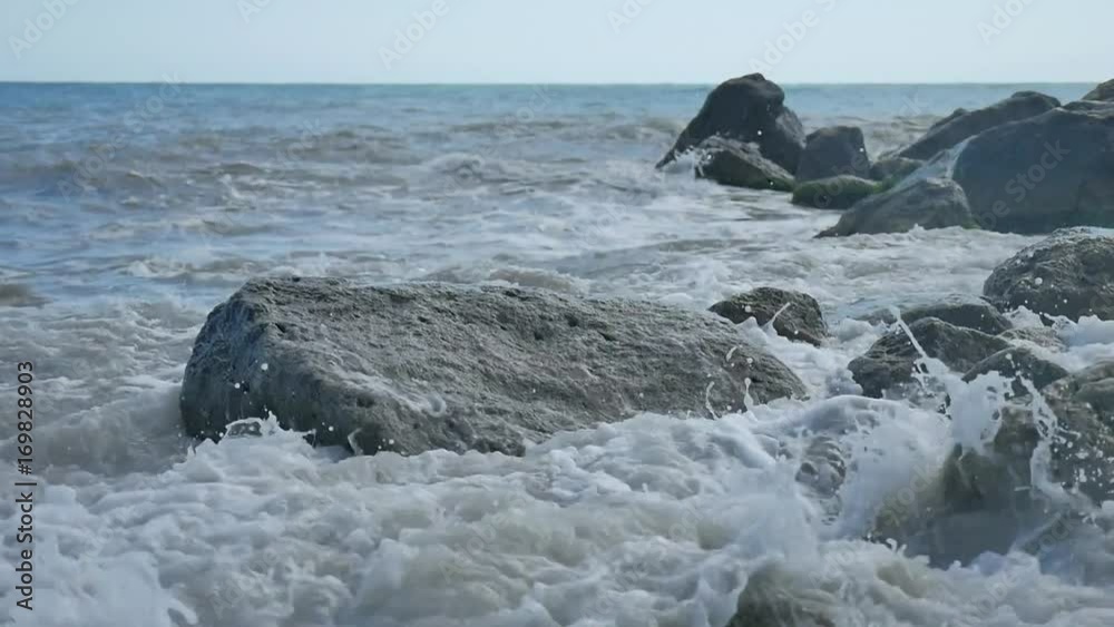 Sea beach storm mountains nature stones strong waves water the landscape slow motion video Sea beach storm mountains nature stones strong waves water the landscape slow motion video
