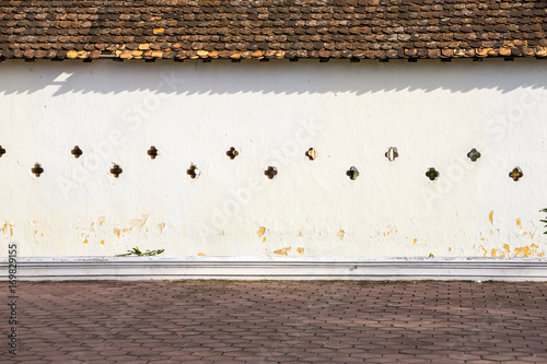 Wall of Wat Phra That Luang Wiang Chan, Laos photo