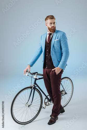 stylish man with bicycle