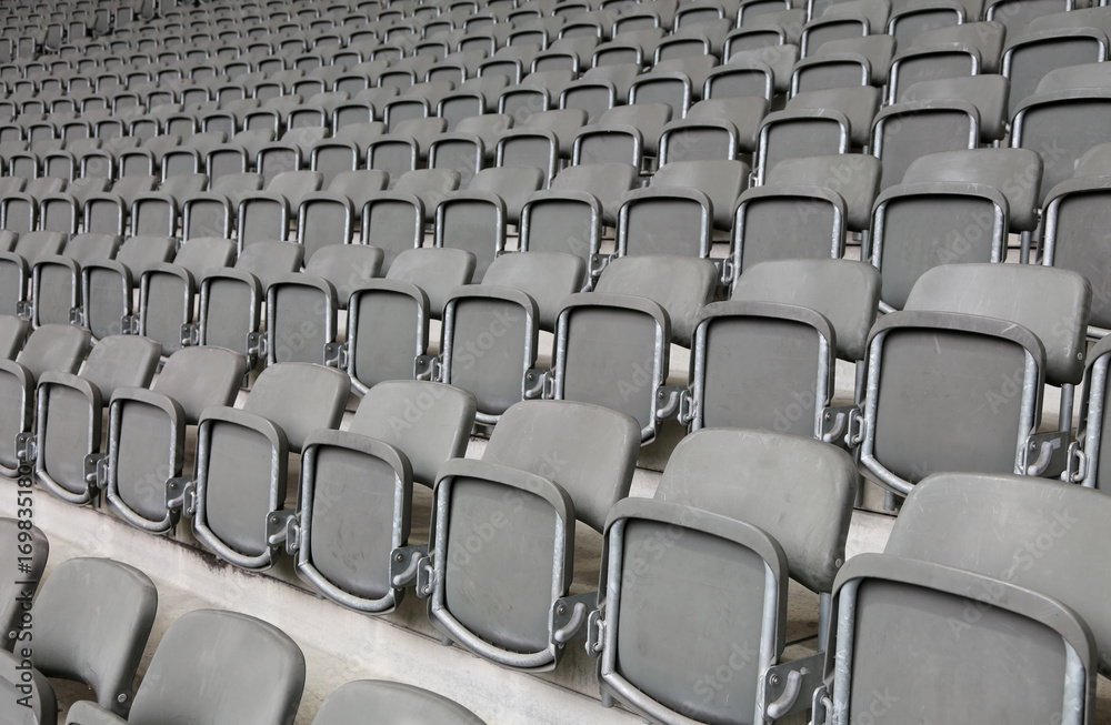 reclining chairs on the stadium bleachers with nobody reclining chairs on the stadium bleachers with nobody