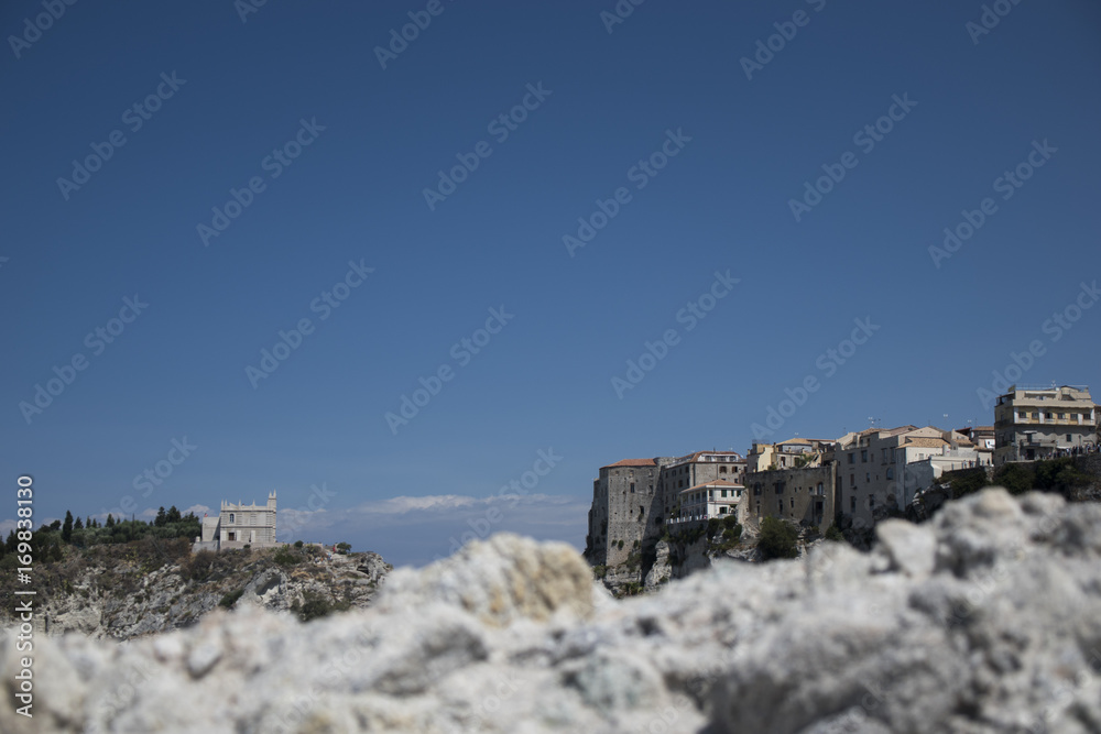 vista del paese di tropea e del santuario Santa maria dell'isola , calabria , italia 