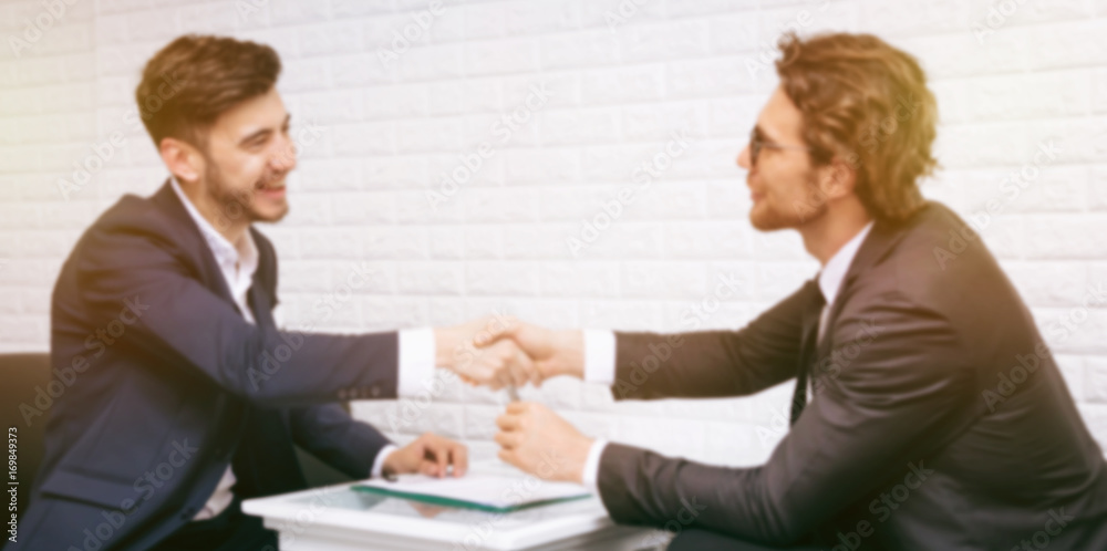 Blurred Business People Shaking Hand with Partner After Finished Meeting Room with Happy - Business Concept Blurred Business People Shaking Hand with Partner After Finished Meeting Room with Happy - Business Concept