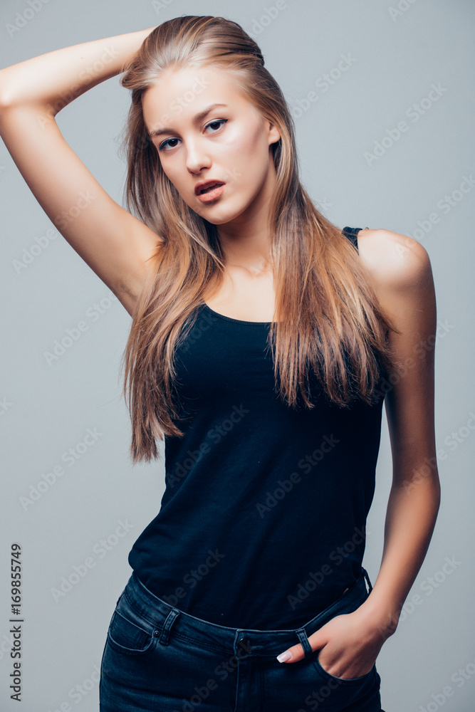 Beautiful woman portrait close up studio on gray Beautiful woman portrait close up studio on gray