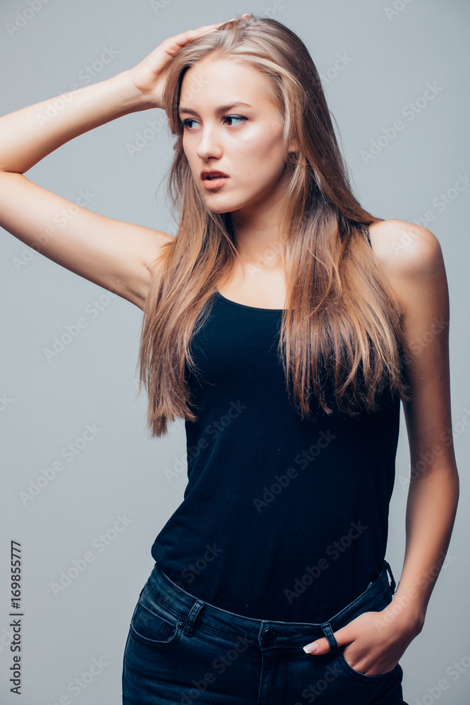 Beautiful woman portrait close up studio on gray Beautiful woman portrait close up studio on gray