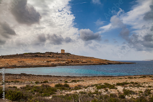 Coast of Malta with old British fort. Sky with drwmatic clouds