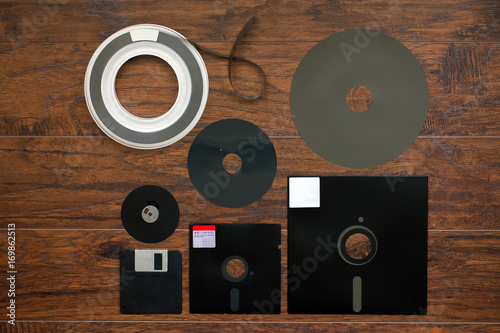 The old 8-inch 5.25-inch, 3.5-inch floppy disk, magnetic tape for an old IBM computer, a comparison with Floppy Inside part
