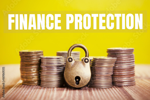 money, padlock, inscription: "finance protection"
