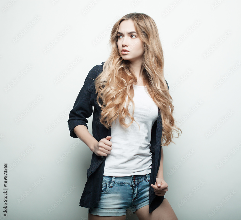 lifestyle, fashion and people concept: beautiful woman wearing casual clothes, posing on white background lifestyle, fashion and people concept: beautiful woman wearing casual clothes, posing on white background