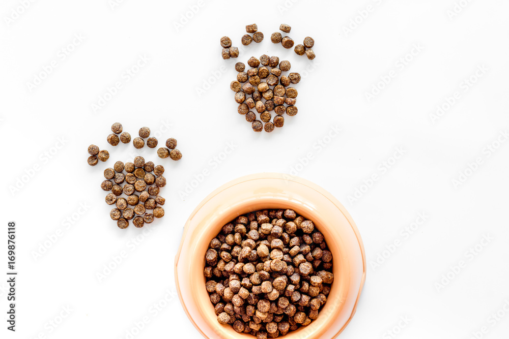 dry pet - dog food in bowl on white background top view mock up dry pet - dog food in bowl on white background top view mock up