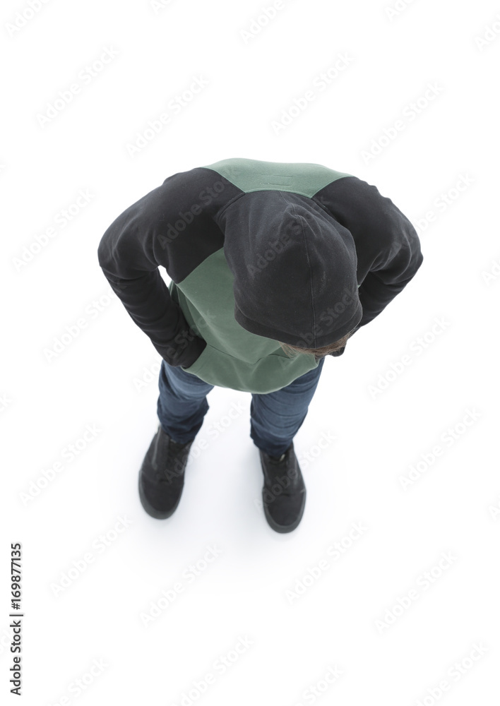 view from above. Hipster in a jacket with a hood looking down view from above. Hipster in a jacket with a hood looking down