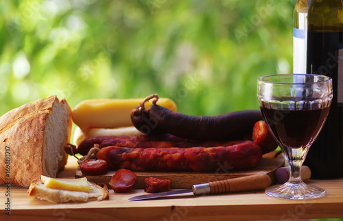Meat, cheese, bread and red wine, traditional food of region alentejo, Portugal