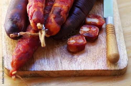 portuguese sausage chourico and knife on table