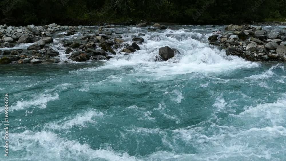 Wild clear blue stream in Morkidsdalen park Skjolden Norway Wild clear blue stream in Morkidsdalen park Skjolden Norway