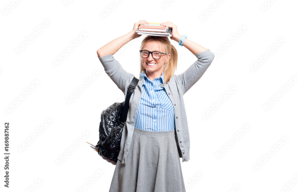 Happy young student girl holding books. Back to school Happy young student girl holding books. Back to school