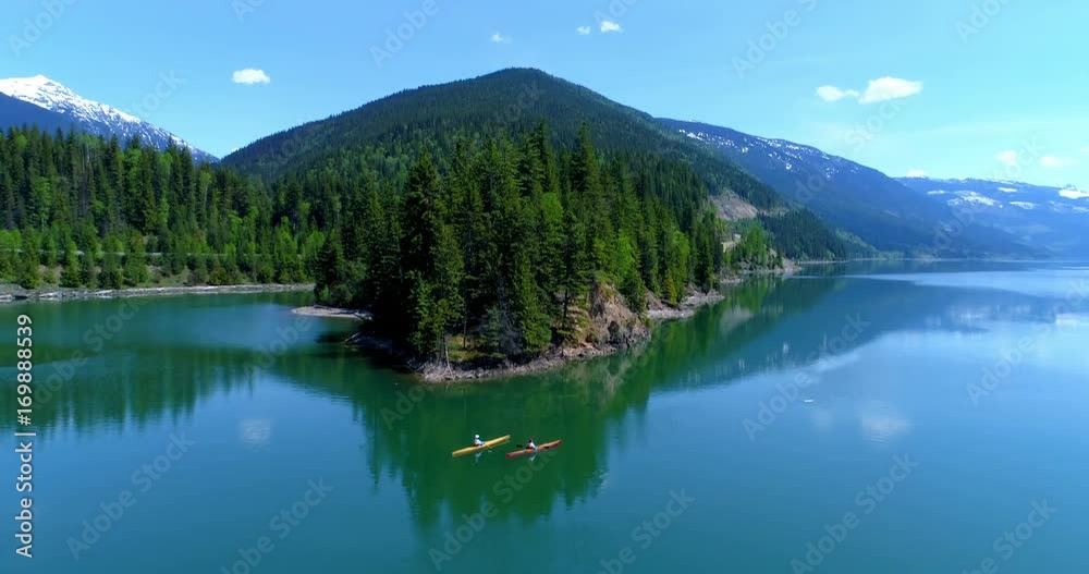 People kayaking in lake People kayaking in lake