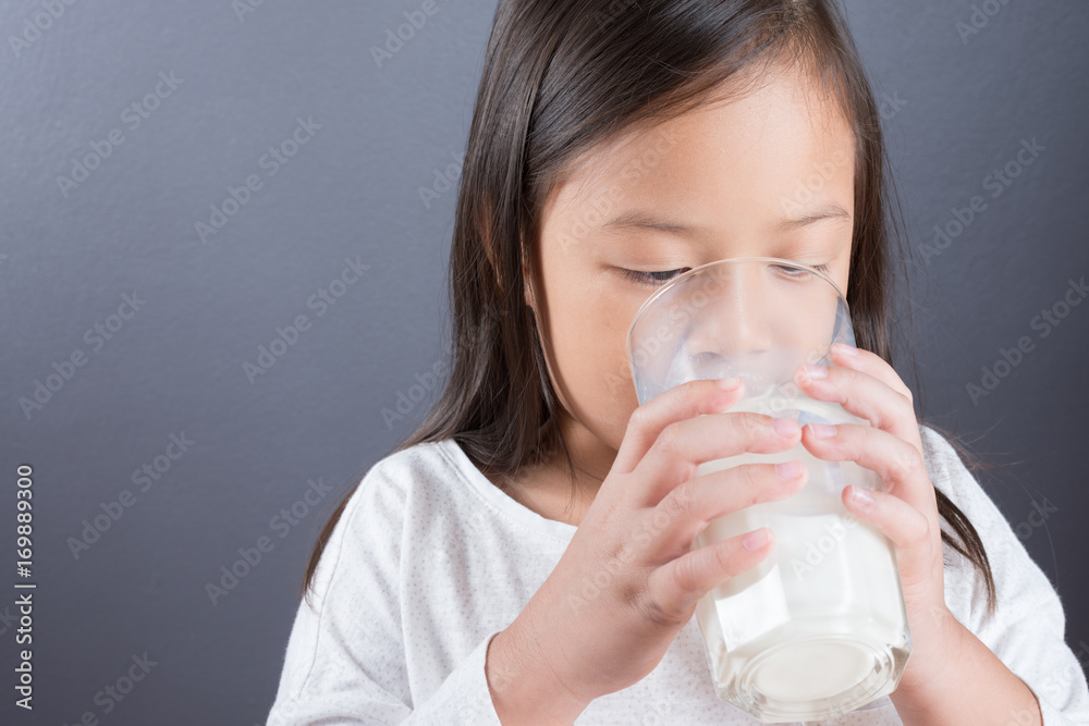 Asian kid cute girl happy to drink milk Asian kid cute girl happy to drink milk