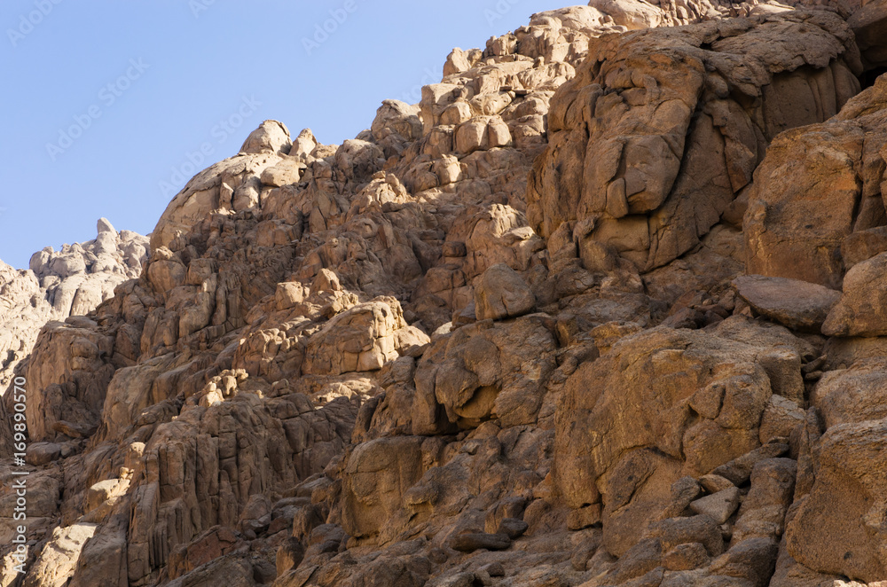 Brown rocks of Sinai, against the sky