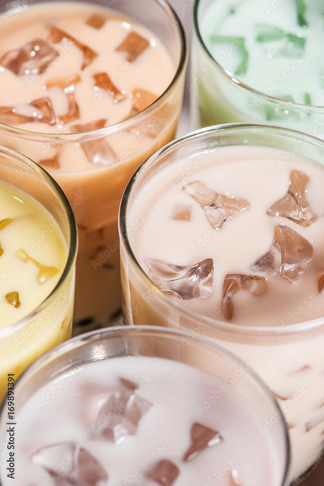 Boba / Bubble tea. Homemade Various Milk Tea with Pearls on wooden table. Boba / Bubble tea. Homemade Various Milk Tea with Pearls on wooden table.