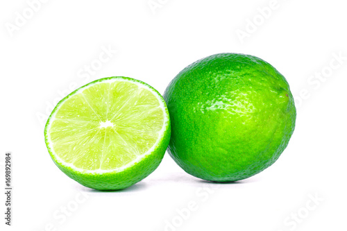 Fresh Green Lime and half isolated on white background