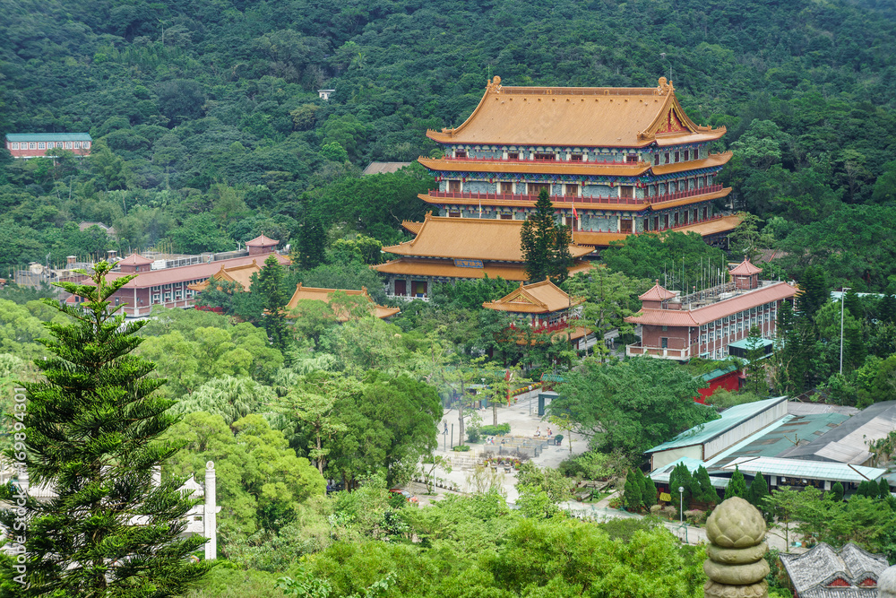 View of Po Lin Buddhist Monastery from afar. Located on Ngong Ping Plateau, on Lantau Island, Hong Kong.