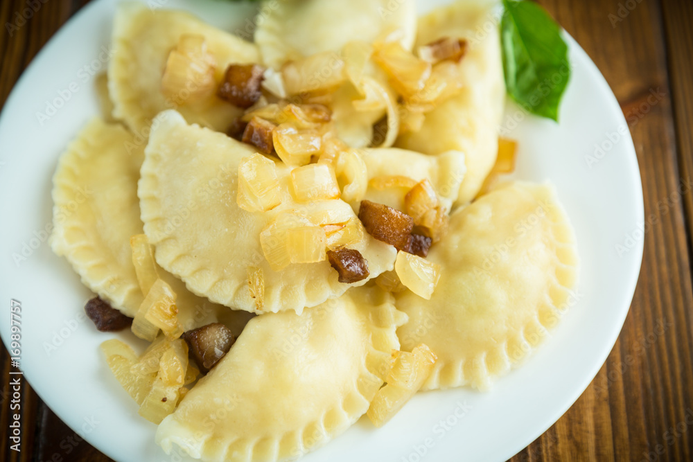 boiled dumplings with potatoes and fried onions boiled dumplings with potatoes and fried onions