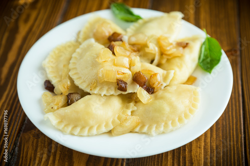 boiled dumplings with potatoes and fried onions