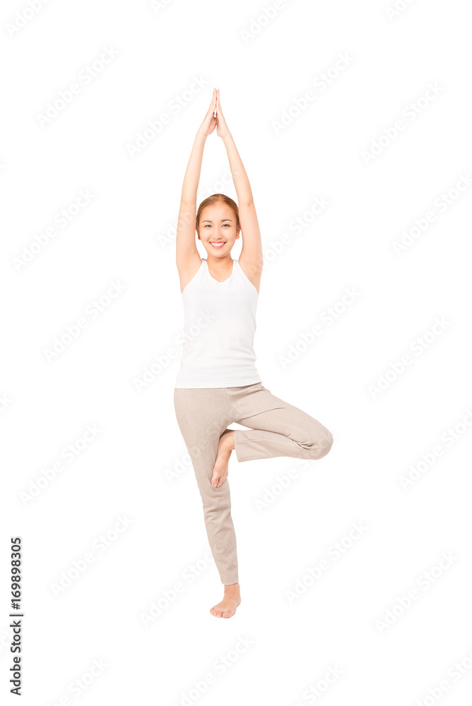 Pretty slim smile woman fitness Yoga exercises .A asian girl practicing yoga as a form of relaxation ,studio full length shot , isolated on white Pretty slim smile woman fitness Yoga exercises .A asian girl practicing yoga as a form of relaxation ,studio full length shot , isolated on white