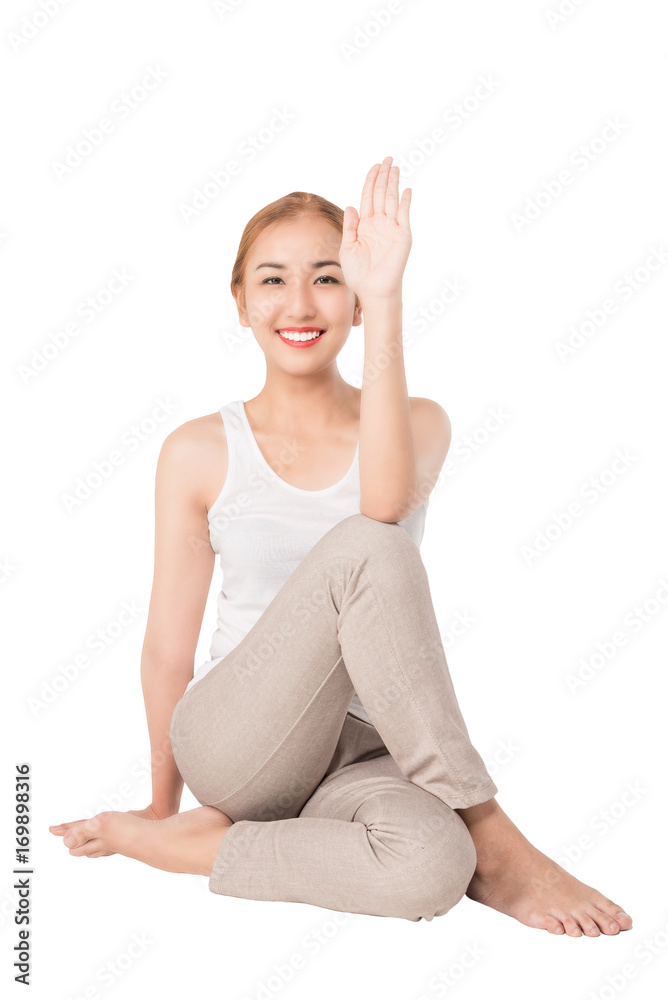 Pretty slim smile woman fitness Yoga exercises .A asian girl practicing yoga as a form of relaxation ,studio full length shot , isolated on white Pretty slim smile woman fitness Yoga exercises .A asian girl practicing yoga as a form of relaxation ,studio full length shot , isolated on white