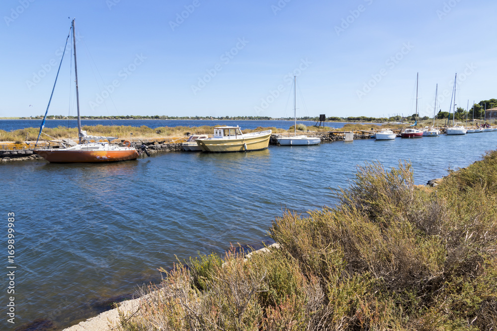 Fototapeta premium Boats in the Canal du Midi at Les Onglous. A World Heritage Site. Agde, France