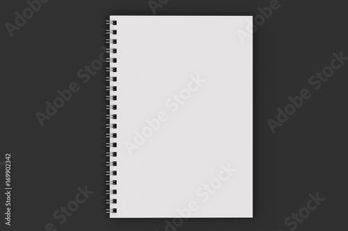 Opend notebook spiral bound on black background