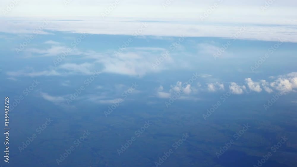 Traveling by air. View through an airplane window. Traveling by air. View through an airplane window.