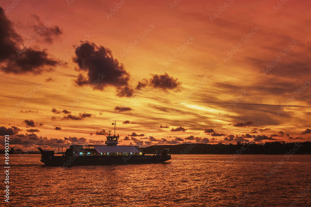very beautiful colors in the evening sunlight shines on the ships in port