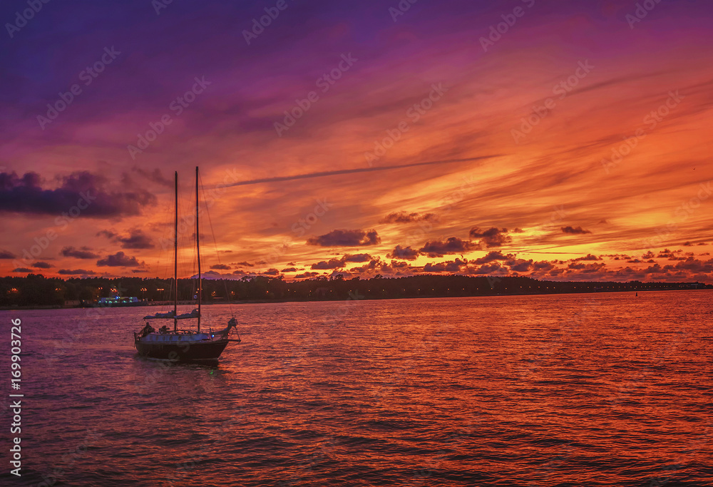 Fototapeta premium very beautiful colors in the evening sunlight shines on the ships in port