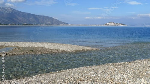 Stream going in to the sea from the Igroviotopos Moustou park in Greece photo