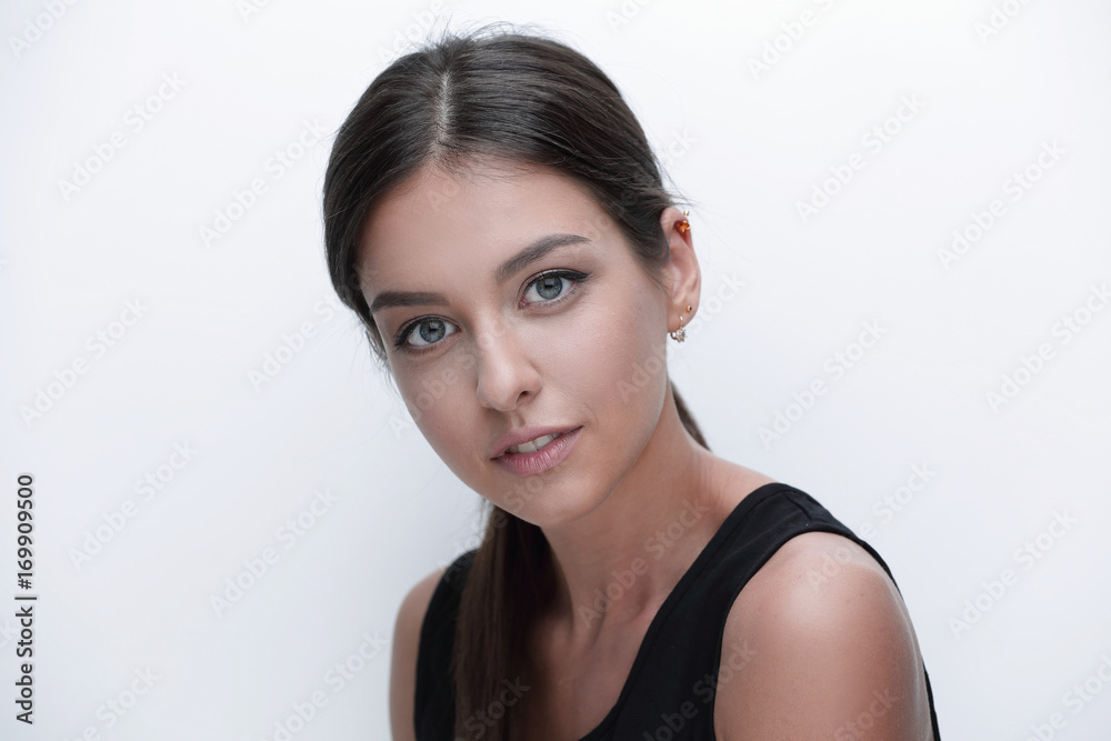 Portrait of a cute young woman. The concept of youth and skin ca Portrait of a cute young woman. The concept of youth and skin ca