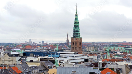 Cityscape, aerial view from the observation deck at the top of the Rundetaarn or Round Tower in old town, rainy day, Copenhagen, Denmark