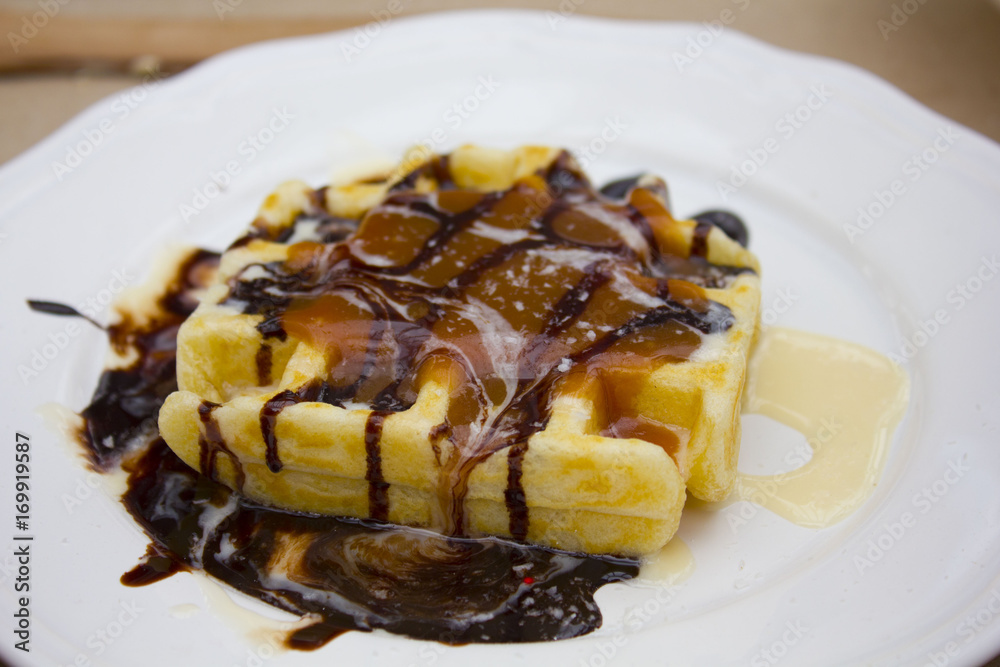 Belgian waffle with ice cream, chocolate and mint Belgian waffle with ice cream, chocolate and mint