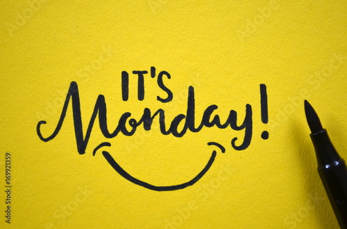 IT'S MONDAY hand lettered on yellow background photo