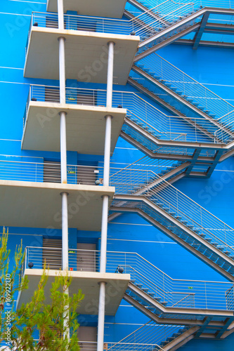 Fire escape ladder on the side of a new building photo