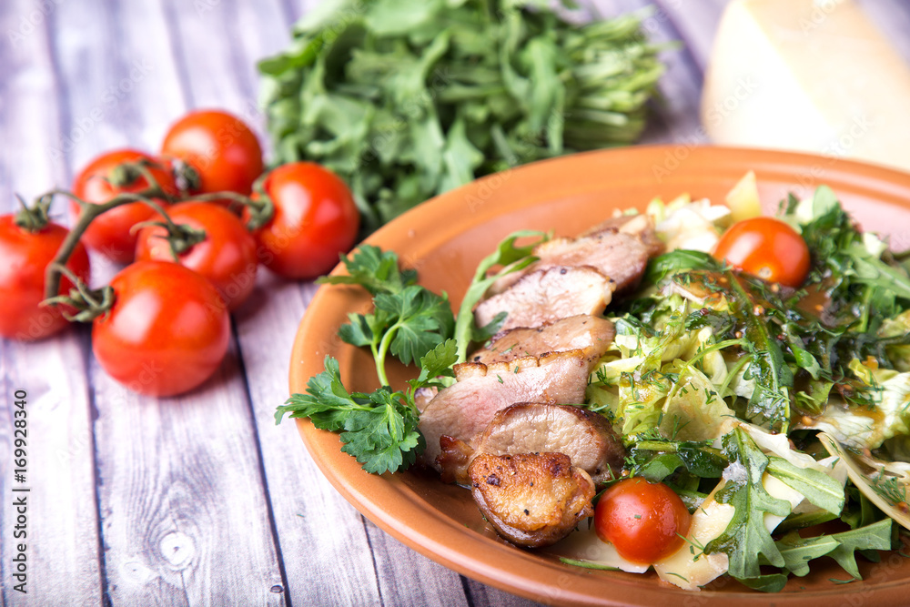 Meat slices with salad and vegetables Meat slices with salad and vegetables
