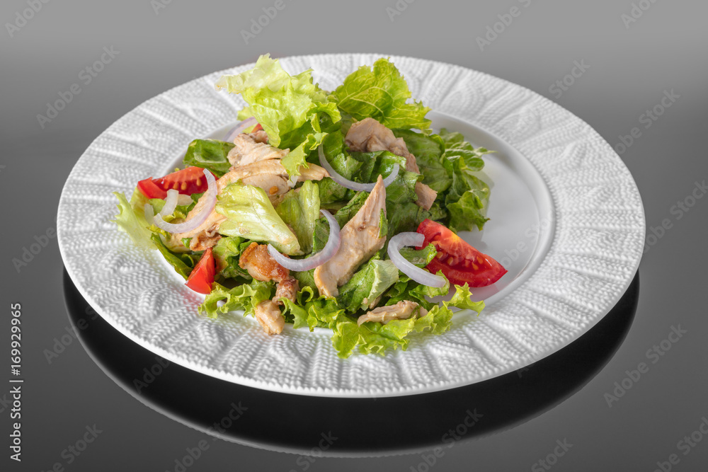 Salad with vegetables and chicken meat