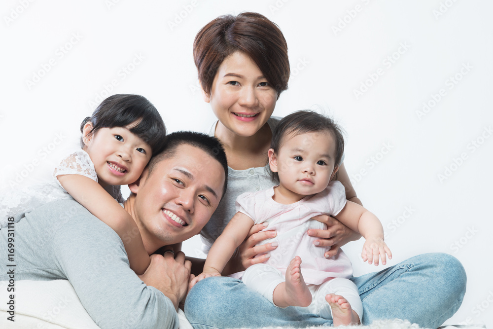 Young happy Asian family with kids Young happy Asian family with kids