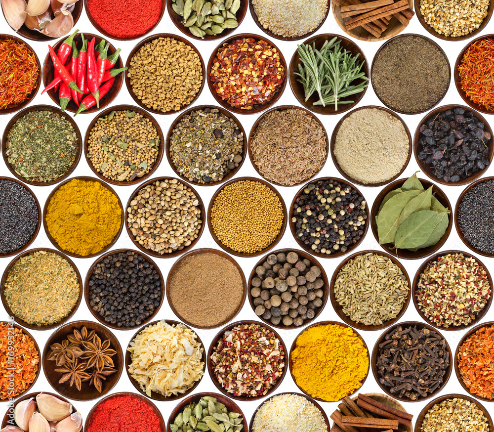 Seamless pattern with different spices isolated on white background.