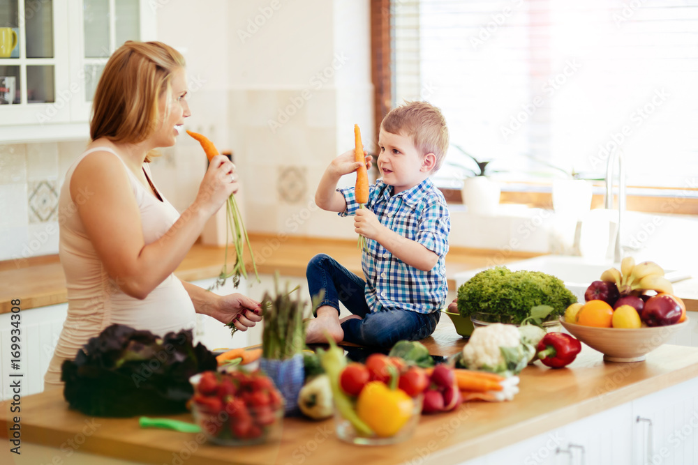 Mother and child preparing lunch