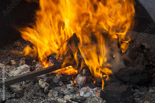 Slika na platnu Old-fashioned blacksmith furnace with burning coals