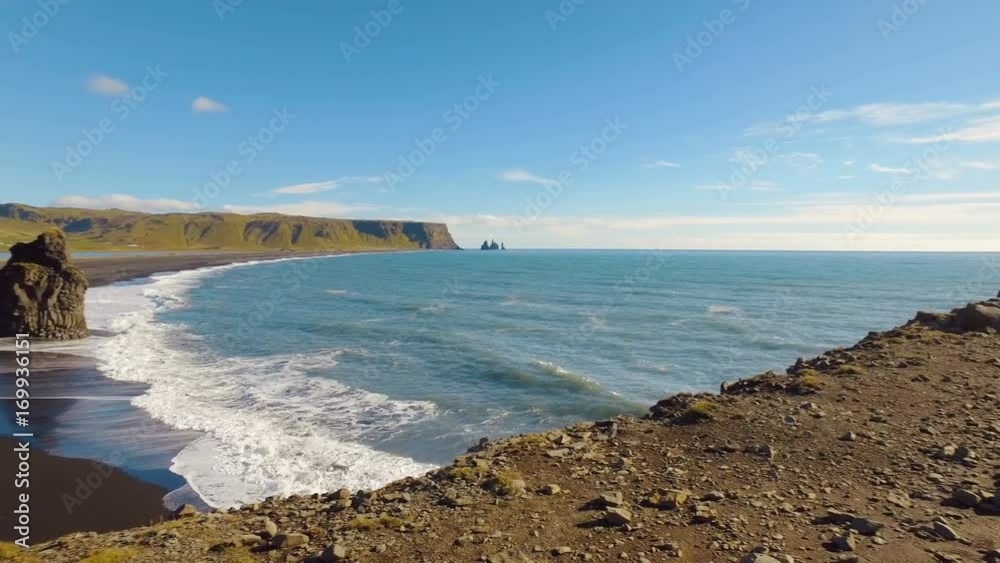 panorama of landscape on a southern coastline of Iceland in sunny day, Reynisdrangar panorama of landscape on a southern coastline of Iceland in sunny day, Reynisdrangar