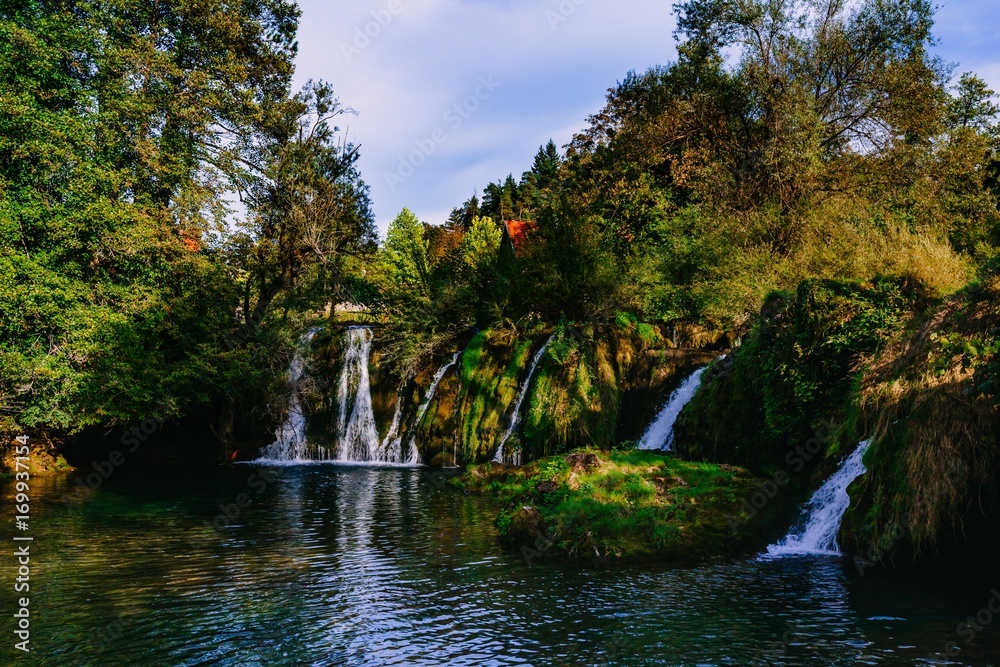 Waterfall on Korana river canyon in village of Rastoke. Slunj in Croatia Waterfall on Korana river canyon in village of Rastoke. Slunj in Croatia